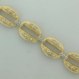 Oliver Smith 18 karat yellow g